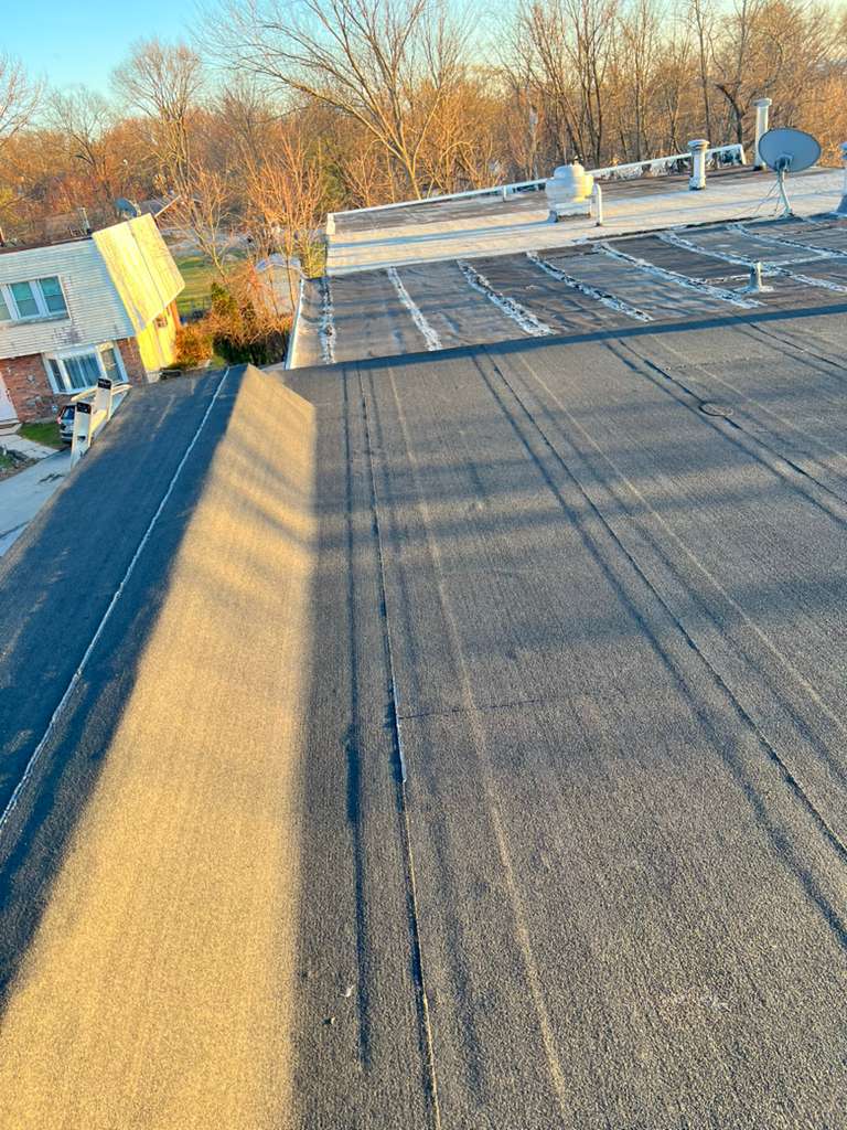 Roofing and exterior project photo 06